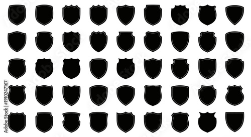 Collection of various shield shapes in black silhouette.