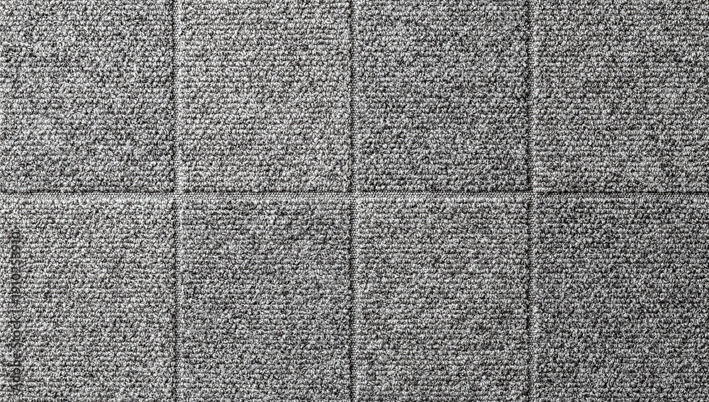 Fototapeta premium Gray carpet flooring with square grid pattern