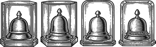 Four vintage service bells in display cases with classic engraved designs