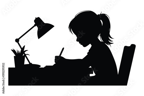 Silhouette of a girl studying at a desk with a lamp