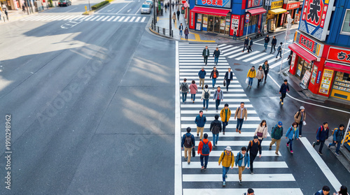 Wallpaper Mural Pedestrians cross a crosswalk in Japan, created AI Torontodigital.ca