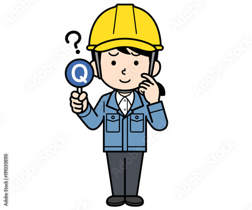 Qの札を持つヘルメットをかぶった現場監督の女性