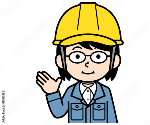 案内するヘルメットをかぶった現場監督の中年女性