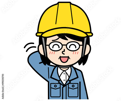 照れているヘルメットをかぶった現場監督の中年女性