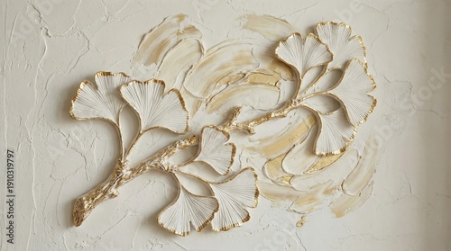 Elegant gold-accented ginkgo leaf branch wall art on textured neutral background with beige and shimmering brushstrokes