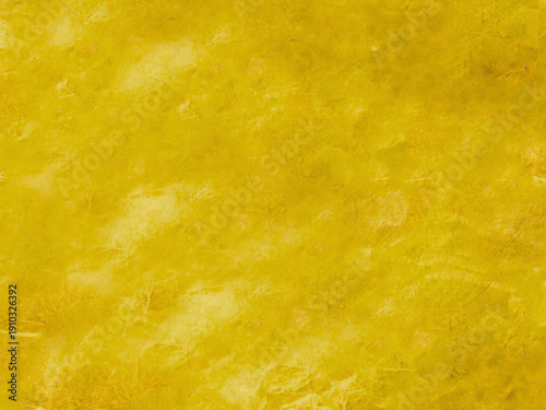 Textured golden abstract with a soft, brushed appearance