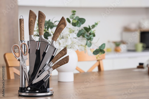 Set of knives on table in k...
