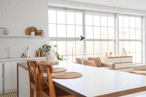 Interior of kitchen with ta...