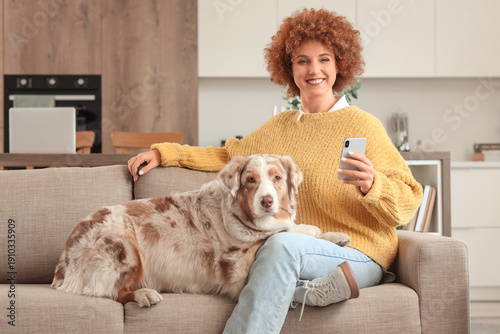 Smiling young woman with cu...