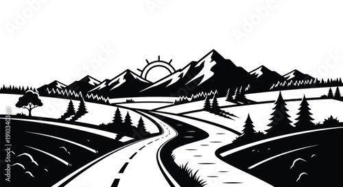 A winding road leads through a mountainous landscape at sunrise