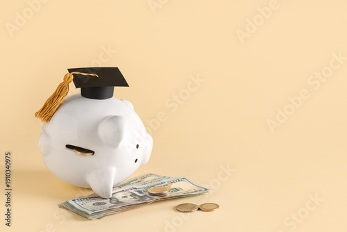 Piggy bank with graduation ...