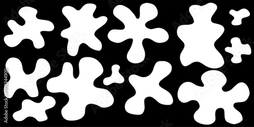 Black cartoon style water splash shapes with bold puddles and rounded liquid waves. Flat vector set for graphic backgrounds frames splat elements and playful designs