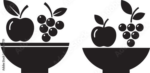 Simple black and white icons of an apple and grapes in a bowl, healthy food concept