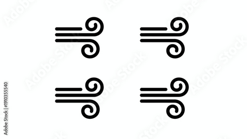 Four black swirls arranged in a square pattern on a clean background viewed from directly above