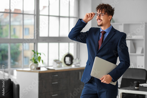 Young male bank manager wit...