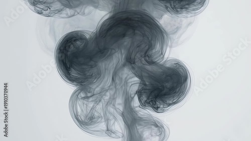 Beautiful ink-style smoke diffusion resembling liquid art movement.