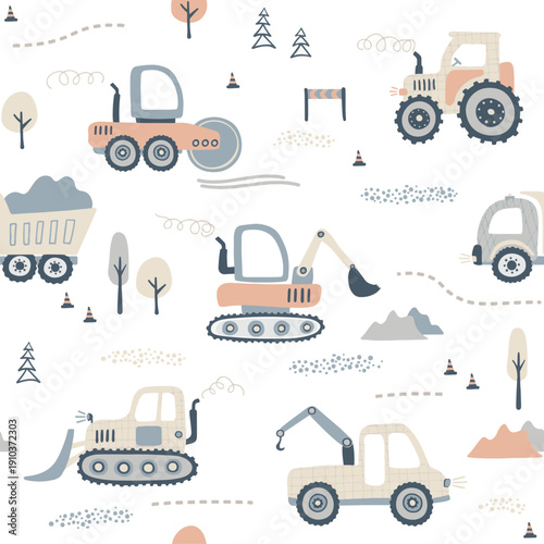 Construction vehicles at work on a building site with trees and mountains