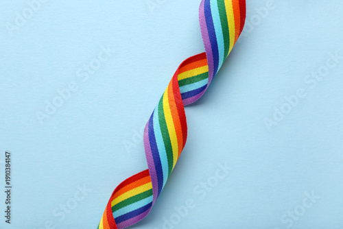 Rainbow ribbon on blue back...