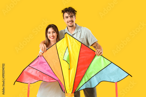 Happy young couple with col...