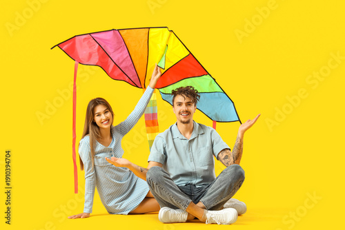 Happy young couple with col...