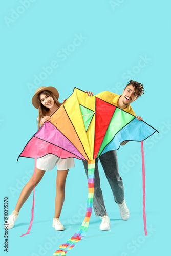 Happy young couple with col...