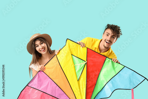 Happy young couple with col...