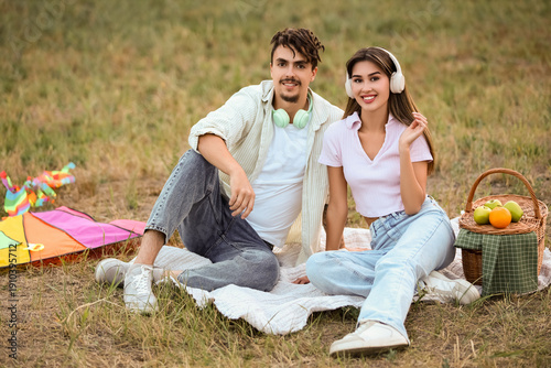 Happy young couple with col...