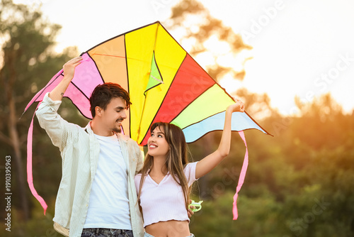 Happy young couple with col...