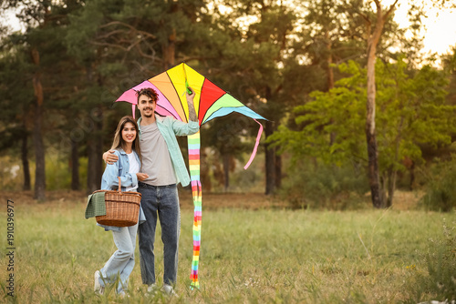 Happy young couple flying c...
