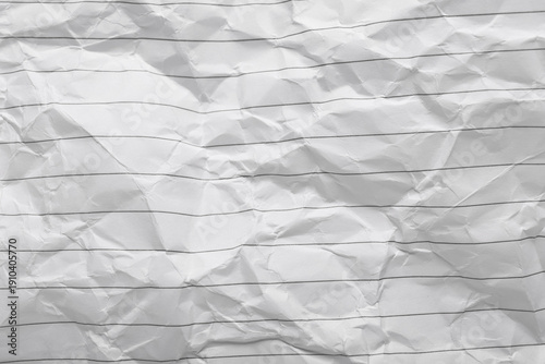 Crumpled lined notebook pag...