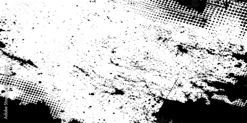 An abstract black and white grunge background featuring an artistic ink splash texture with paint splatter stains and a dirty spray pattern vector illustration