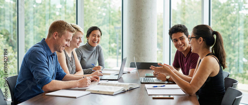 Young Adults Studying and Discussing in Campus Study Room
