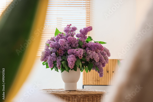 Vase with beautiful lilac f...