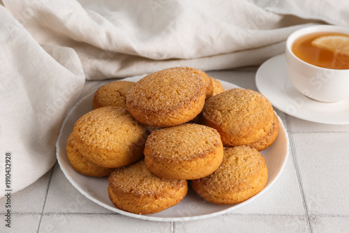 Plate with sweet cookies an...