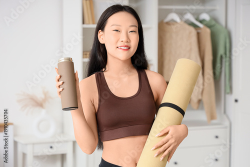 Sporty Asian woman with the...