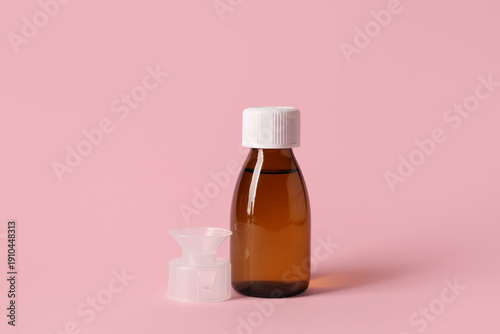 Bottle of cough syrup and m...