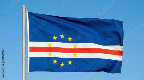 Cape Verde flag waving in the wind against clear blue sky