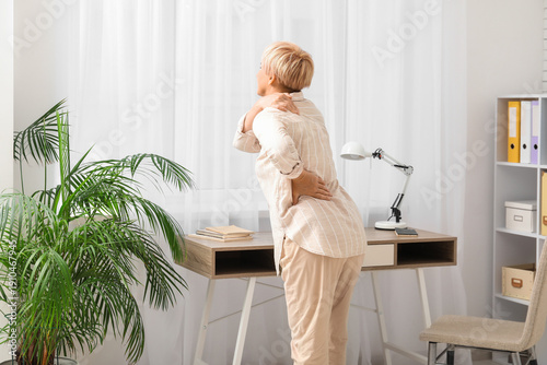 Mature woman suffering from...