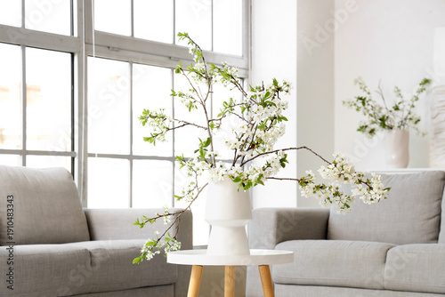 Vase with blooming branches...