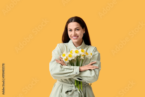 Happy young woman with bouq...