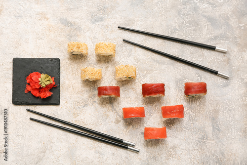 Tasty sushi rolls with chop...