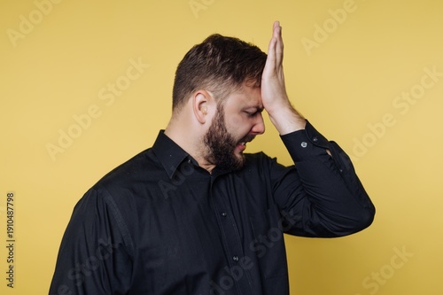 Canvas Print Man experiencing frustration and disappointment against a vibrant yellow backgro