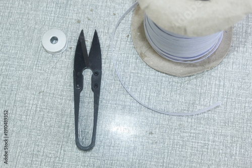 Sewing Tools and Equipment with a Sewing project on a Boutique Shop