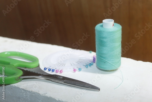 Sewing Tools and Equipment with a Sewing project on a Boutique Shop