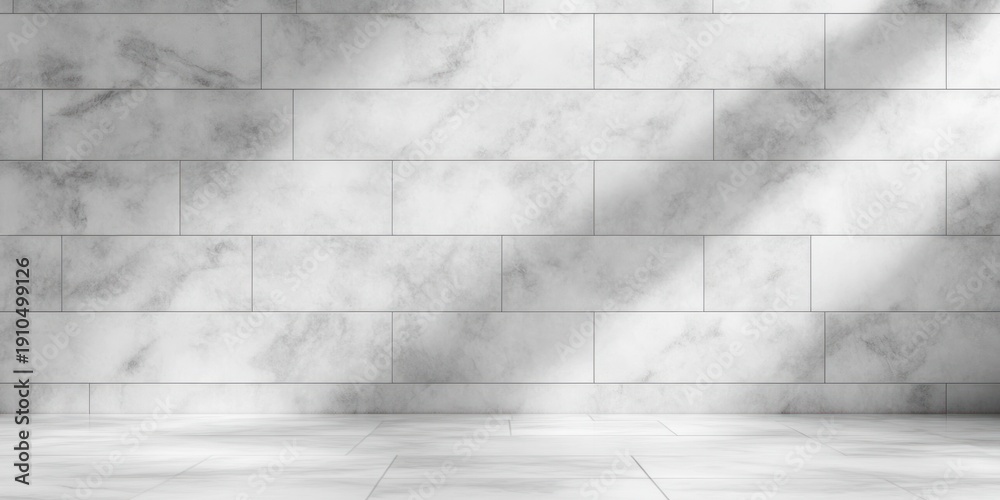 Fototapeta premium Empty minimalist interior with white veined marble tiled wall and floor and soft diagonal sunlight creating a calm, serene atmosphere