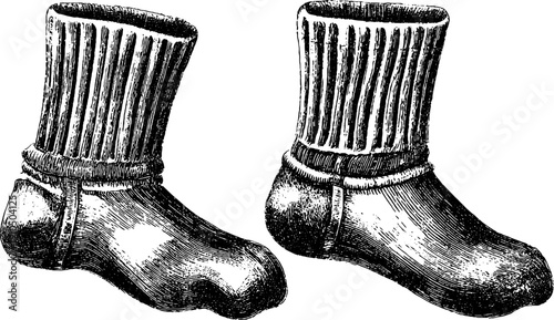 Vintage engraved illustration of knitted socks in bold black lines for retro design