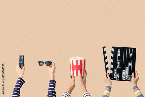 Many hands with movie clapp...