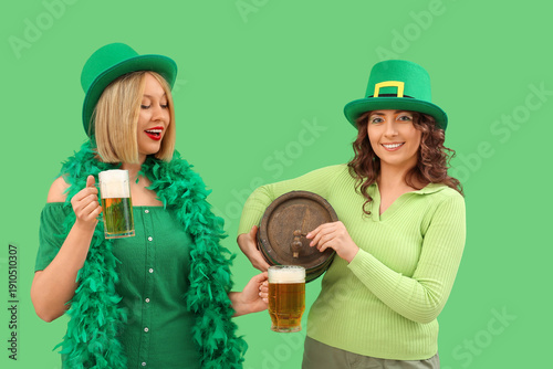 Happy women with beer on gr...