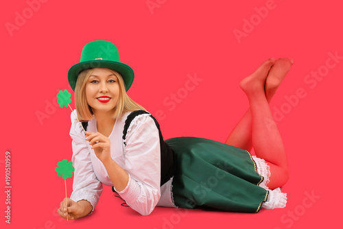 Woman with green paper clov...