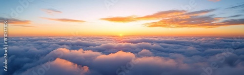 Panel kuchenny z motywem aerial sunrise above a sea of soft fluffy clouds with a golden horizon and tranquil pastel sky conveying peaceful calm